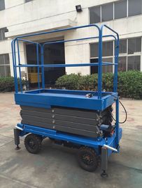 Hydraulic Mobile Scissor Lift 6 Meters Platform Height 1 Ton Loading Capacity For Exhibition Hall